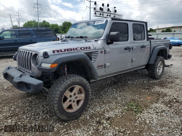 2020 Jeep Gladiator Rubicon z VIN 1C6JJTBG7LL102712, wystawiony jako Copart lot #60887965 z przebiegiem 80 262 mil mil oraz Szkoda całkowita • Salvage title. Historia ofert i sprzedaży dostępna na DreamBid. Obrazek 1.