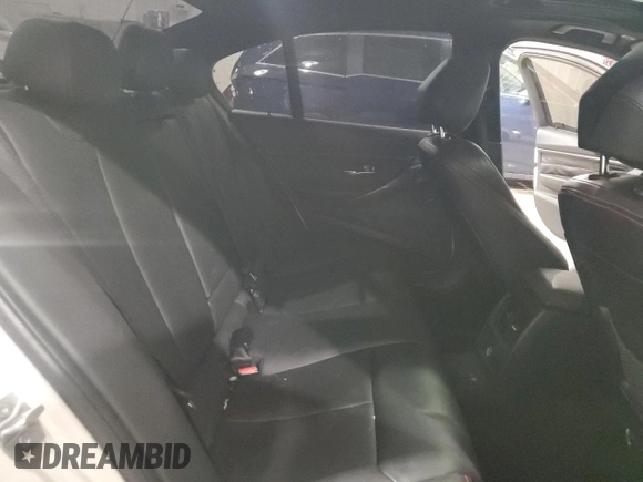 2013 BMW 3 Series 335i with VIN WBA3A9G51DNP36712, listed as a Copart auction lot 52407465 with 117,972 mi miles and Salvage title. Bid and sale history available at DreamBid. Image 10.