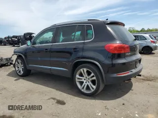 2013 Volkswagen Tiguan SE z VIN WVGAV7AX4DW523112, wystawiony jako Copart lot #53261855 z przebiegiem 86 190 mil mil oraz Szkoda całkowita • Salvage title. Historia ofert i sprzedaży dostępna na DreamBid. Obrazek 2.