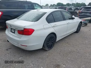 2013 BMW 3 Series 328i xDrive with VIN WBA3B5C5XDJ598557, listed as a IAAI auction lot 42747733 with 153,989 mi miles and . Bid and sale history available at DreamBid. Image 4.