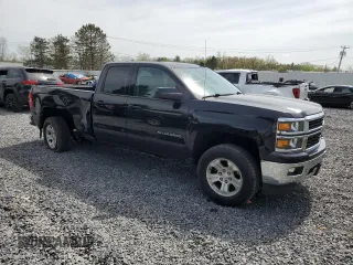 2015 Chevrolet Silverado 1500 LT with VIN 1GCVKREC5FZ357105, listed as a Copart auction lot 54959165 with 68,204 mi miles and Salvage Title. Bid and sale history available at carsss.com. Image 4.