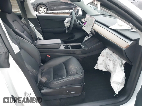 2021 Tesla Model Y Performance with VIN 5YJYGDEF6MF261711, listed as a IAAI auction lot 41176208 with 25,687 mi miles and . Bid and sale history available at DreamBid. Image 5.