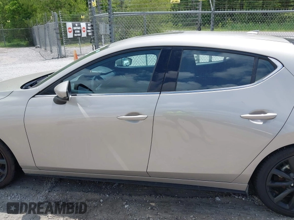 2022 Mazda Mazda3 Hatchback Premium with VIN JM1BPAML5N1507556, listed as a IAAI auction lot 42087802 with 56,507 mi miles. Bid and sale history available at carsss.com. Image 14.