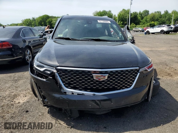 2025 Cadillac XT6 AWD Premium Luxury z VIN 1GYKPDRS9SZ120694, wystawiony jako Copart lot #57130005 z przebiegiem Nie podano mil oraz Szkody całkowita. Historia ofert i sprzedaży dostępna na DreamBid. Obrazek 5.
