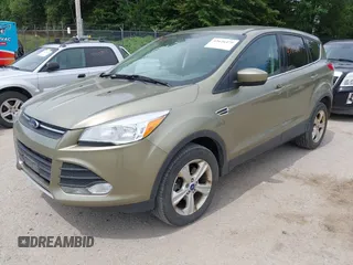 2013 Ford Escape SE z VIN 1FMCU9G92DUB27580, wystawiony jako IAAI lot #42626479 z przebiegiem 67 891 mil mil oraz . Historia ofert i sprzedaży dostępna na DreamBid. Obrazek 2.