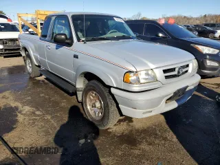 2002 Mazda B-Series 2WD Truck DS with VIN 4F4YR16U12TM05057, listed as a Copart auction lot 80523964 with 63,219 mi miles and Salvage Title. Bid and sale history available at carsss.com. Image 4.