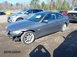 2009 BMW 3 Series 335i xDrive with VIN WBAWC73519E269820, listed as a IAAI auction lot 41794929 with 122,691 mi miles. Bid and sale history available at carsss.com. Image 2.