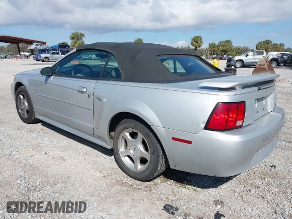 2003 Ford Mustang Deluxe z VIN 1FAFP44453F379157, wystawiony jako IAAI lot #41612382 z przebiegiem 107 599 mil mil oraz . Historia ofert i sprzedaży dostępna na DreamBid. Obrazek 3.