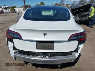 2020 Tesla Model 3 Standard Range Plus with VIN 5YJ3E1EA4LF644967, listed as a IAAI auction lot 41745984 with 23,479 mi miles and . Bid and sale history available at DreamBid. Image 17.