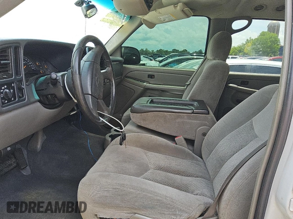 2004 Chevrolet Tahoe LS z VIN 1GNEC13V84R288076, wystawiony jako Copart lot #58320985 z przebiegiem 263 726 mil mil oraz Szkoda całkowita • Salvage title. Historia ofert i sprzedaży dostępna na DreamBid. Obrazek 7.