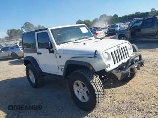 2014 Jeep Wrangler Sport with VIN 1C4AJWAG5EL176998, listed as a IAAI auction lot 40585450 with 114,432 mi miles and . Bid and sale history available at DreamBid. Image 1.