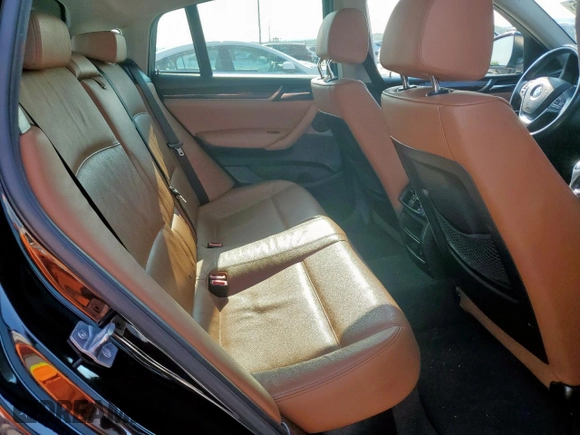2015 BMW X4 xDrive28i with VIN 5UXXW3C52F0M87621, listed as a Copart auction lot 59176505 with 163,727 mi miles and Salvage title. Bid and sale history available at DreamBid. Image 11.