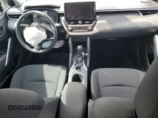 2024 Toyota Corolla Cross LE with VIN 7MUCAAAG9RV091989, listed as a Copart auction lot 55823575 with 14,389 mi miles and Salvage title. Bid and sale history available at DreamBid. Image 8.