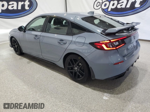 2023 Honda Civic Sport z VIN 19XFL2H89PE020319, wystawiony jako Copart lot #54294065 z przebiegiem 11 192 mil mil oraz Czysty tytuł • Clean title. Historia ofert i sprzedaży dostępna na DreamBid. Obrazek 2.