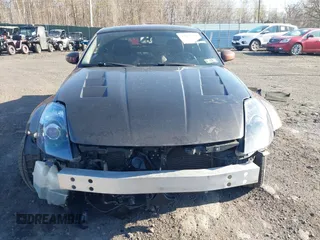 2006 Nissan 350Z Touring z VIN JN1AZ34E46M352021, wystawiony jako IAAI lot #42071456 z przebiegiem 163 900 mil mil oraz . Historia ofert i sprzedaży dostępna na DreamBid. Obrazek 12.
