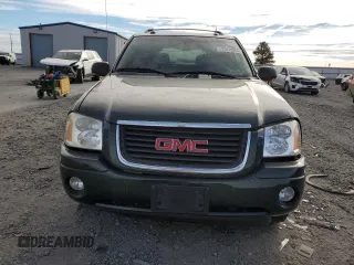 2004 GMC Envoy SLT with VIN 1GKDT13S642185410, listed as a Copart auction lot 72572504 with 136,193 mi miles and Salvage Title. Bid and sale history available at DreamBid. Image 5.