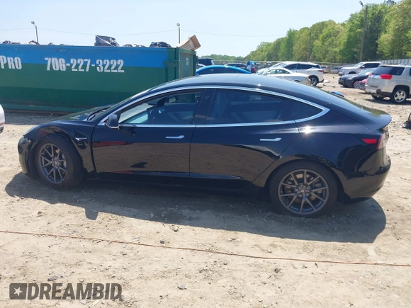2018 Tesla Model 3 Long Range Battery with VIN 5YJ3E1EB1JF122786, listed as a IAAI auction lot 42010451 with 85,510 mi miles and . Bid and sale history available at DreamBid. Image 14.