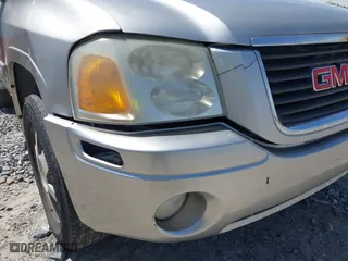 2005 GMC Envoy SLE with VIN 1GKDS13S652390259, listed as a IAAI auction lot 41825258 with 162,172 mi miles. Bid and sale history available at carsss.com. Image 6.