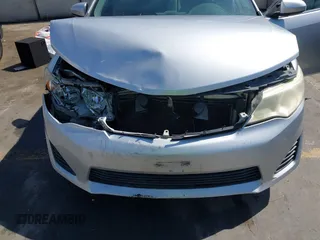 2013 Toyota Camry L with VIN 4T4BF1FKXDR313627, listed as a IAAI auction lot 41855022 with 128,782 mi miles. Bid and sale history available at carsss.com. Image 6.