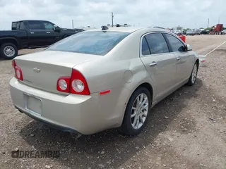 2012 Chevrolet Malibu LTZ with VIN 1G1ZG5E75CF273189, listed as a IAAI auction lot 42065802 with 153,869 mi miles and . Bid and sale history available at DreamBid. Image 4.
