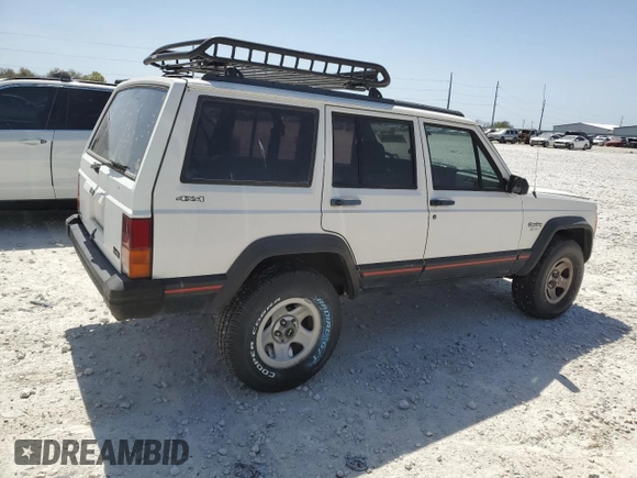1996 Jeep Cherokee Sport with VIN 1J4FJ68S1TL128597, listed as a Copart auction lot 49600545 with 201,074 mi miles and Salvage title. Bid and sale history available at DreamBid. Image 3.