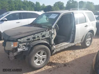 2009 Ford Escape XLT with VIN 1FMCU93G29KC41151, listed as a IAAI auction lot 42078509 with 238,350 mi miles. Bid and sale history available at carsss.com. Image 2.