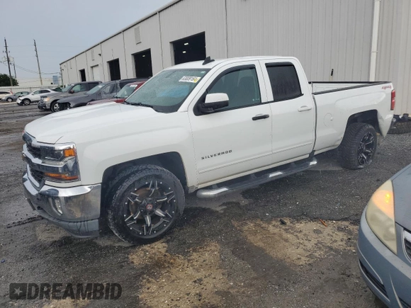 2016 Chevrolet Silverado 1500 LT with VIN 1GCVKREH1GZ424876, listed as a Copart auction lot 63009164 with 79,134 mi miles and Salvage Title. Bid and sale history available at DreamBid. Image 1.