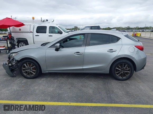 2014 Mazda 3 i Grand Touring with VIN JM1BM1M73E1216596, listed as a IAAI auction lot 41621165 with 127,235 mi miles and . Bid and sale history available at DreamBid. Image 14.
