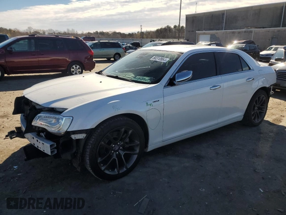 2015 Chrysler 300 C with VIN 2C3CCAET9FH922210, listed as a Copart auction lot 80310864 with 118,931 mi miles and Salvage Title. Bid and sale history available at DreamBid. Image 1.