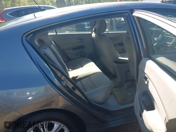 2010 Honda Insight EX with VIN JHMZE2H72AS021555, listed as a IAAI auction lot 42129289 with 172,829 mi miles and . Bid and sale history available at DreamBid. Image 8.