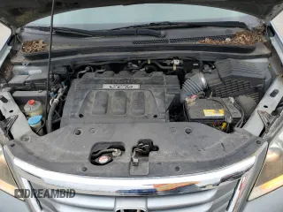 2009 Honda Odyssey EX-L with VIN 5FNRL387X9B055281, listed as a Copart auction lot 53981085 with 153,290 mi miles and Salvage Title. Bid and sale history available at carsss.com. Image 12.