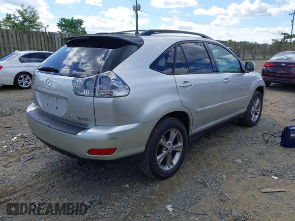 2007 Lexus RX 400h with VIN JTJGW31U672001021, listed as a IAAI auction lot 42209431 with 245,653 mi miles and . Bid and sale history available at DreamBid. Image 4.