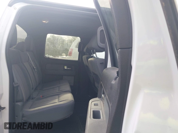 2014 Ford F-150 XL with VIN 1FTFW1EFXEKE92754, listed as a IAAI auction lot 42109551 with 219,130 mi miles. Bid and sale history available at carsss.com. Image 8.