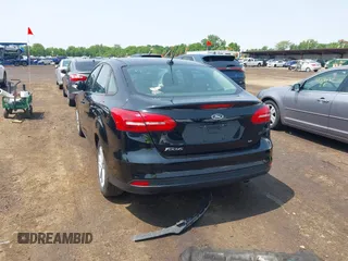 2017 Ford Focus SE with VIN 1FADP3F25HL292056, listed as a IAAI auction lot 42409320 with 102,956 mi miles and . Bid and sale history available at DreamBid. Image 16.