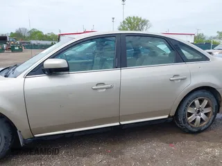 2006 Ford Five Hundred SEL with VIN 1FAFP24186G186073, listed as a IAAI auction lot 42156007 with 283,655 mi miles. Bid and sale history available at carsss.com. Image 14.