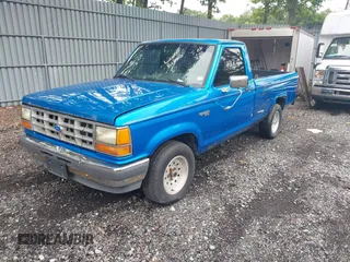 1990 Ford Ranger XLT with VIN 1FTCR10X1LUB39850, listed as a IAAI auction lot 42652695 with 71,872 mi miles and . Bid and sale history available at DreamBid. Image 2.