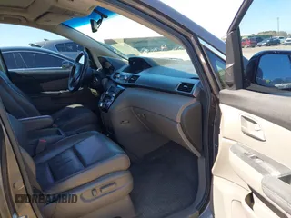 2012 Honda Odyssey Touring with VIN 5FNRL5H91CB057344, listed as a IAAI auction lot 41835272 with 158,854 mi miles. Bid and sale history available at carsss.com. Image 5.