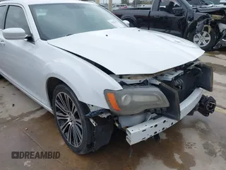 2013 Chrysler 300 with VIN 2C3CCABGXDH735739, listed as a IAAI auction lot 41282492 with 121,487 mi miles. Bid and sale history available at carsss.com. Image 18.