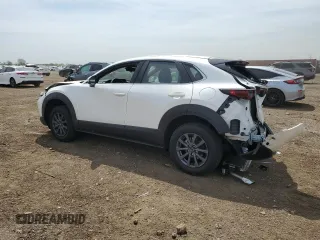 2023 Mazda CX-30 S with VIN 3MVDMBAMXPM586909, listed as a Copart auction lot 55889535 with 21,057 mi miles and Salvage title. Bid and sale history available at DreamBid. Image 2.