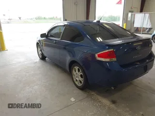 2008 Ford Focus SE with VIN 1FAHP33NX8W133127, listed as a IAAI auction lot 42139364 with 193,882 mi miles. Bid and sale history available at carsss.com. Image 3.