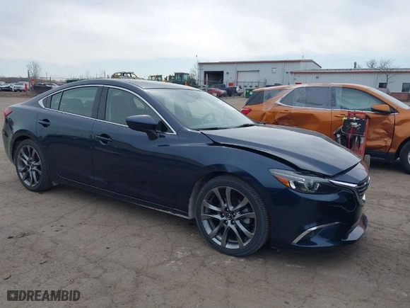 2016 Mazda Mazda6 i Grand Touring with VIN JM1GJ1W57G1486962, listed as a IAAI auction lot 41813471 with 64,078 mi miles. Bid and sale history available at carsss.com. Image 1.