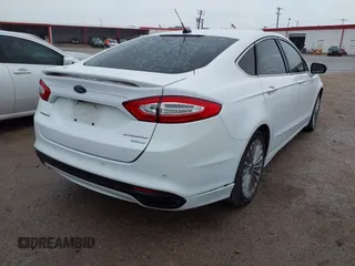 2016 Ford Fusion Titanium with VIN 3FA6P0K92GR400269, listed as a IAAI auction lot 41961043 with 191,638 mi miles and . Bid and sale history available at DreamBid. Image 4.