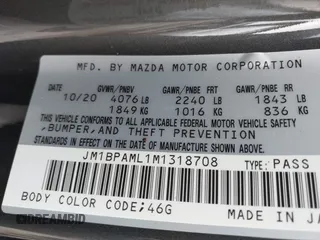 2021 Mazda 3 Premium z VIN JM1BPAML1M1318708, wystawiony jako IAAI lot #42178243 z przebiegiem 62 455 mil mil oraz . Historia ofert i sprzedaży dostępna na DreamBid. Obrazek 9.
