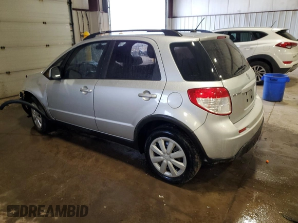 2010 Suzuki SX4 z VIN JS2YB5A31A6302436, wystawiony jako Copart lot #88473455 z przebiegiem 78 839 mil mil oraz Szkody całkowita. Historia ofert i sprzedaży dostępna na DreamBid. Obrazek 2.