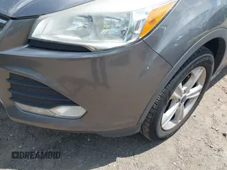 2014 Ford Escape SE with VIN 1FMCU0G98EUB23109, listed as a IAAI auction lot 42186287 with 134,793 mi miles. Bid and sale history available at carsss.com. Image 14.