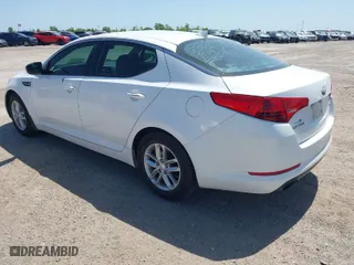 2013 Kia Optima LX with VIN 5XXGM4A7XDG198614, listed as a IAAI auction lot 42021109 with 182,304 mi miles. Bid and sale history available at carsss.com. Image 3.