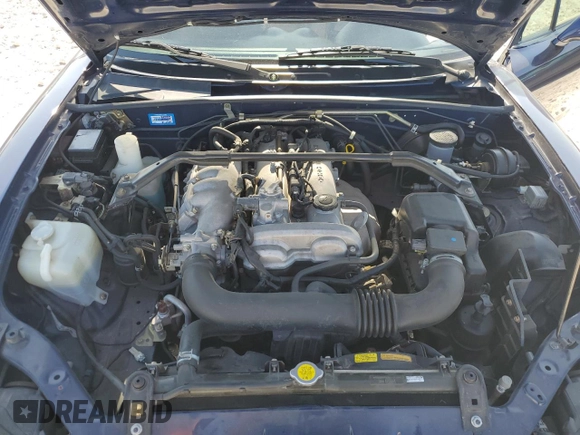 2002 Mazda MX-5 Miata Cloth z VIN JM1NB353720231873, wystawiony jako Copart lot #52398015 z przebiegiem 90 077 mil mil oraz Szkoda całkowita • Salvage title. Historia ofert i sprzedaży dostępna na DreamBid. Obrazek 11.