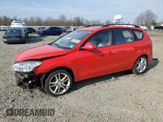 2010 Hyundai Elantra Touring SE with VIN KMHDC8AE3AU066338, listed as a Copart auction lot 48670945 with 124,348 mi miles and Salvage Title. Bid and sale history available at carsss.com. Image 1.