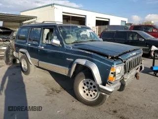 1995 Jeep Cherokee Country with VIN 1J4FJ78S5SL636284, listed as a Copart auction lot 76145234 with 104,048 mi miles and Salvage Title. Bid and sale history available at carsss.com. Image 4.