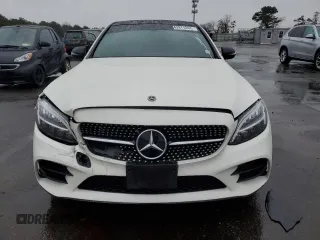 2019 Mercedes-Benz C with VIN NY75020, listed as a Copart auction lot 43911244 with 20,400 mi miles and . Bid and sale history available at DreamBid. Image 5.